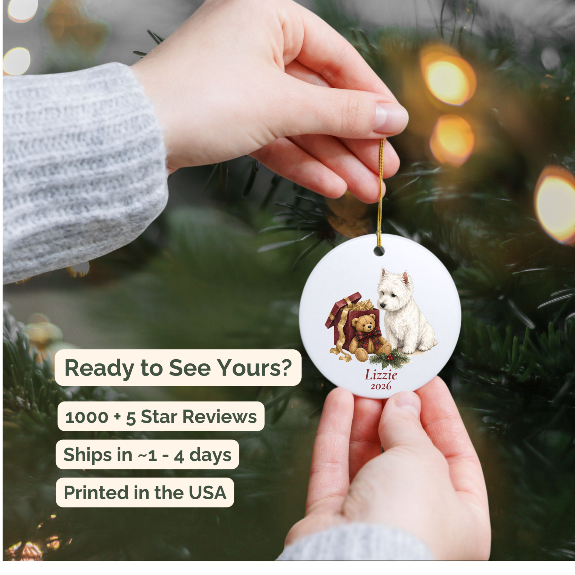 Hand holding a personalized West Highland Terrier ceramic ornament beside a Christmas tree