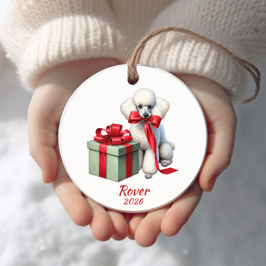 Personalized white Standard Poodle Christmas ornament held in cupped hands