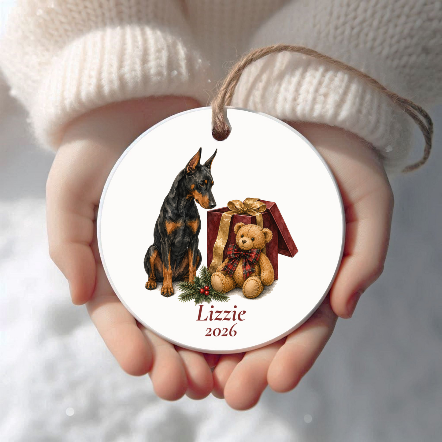 Personalized Doberman Christmas ornament held in cupped hands