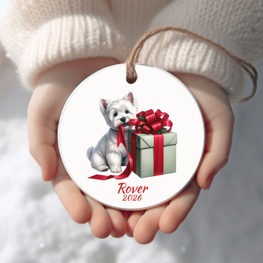 Personalized West Highland Terrier Christmas ornament held in cupped hands