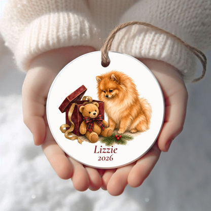 Personalized Pomeranian Christmas ornament held in cupped hands