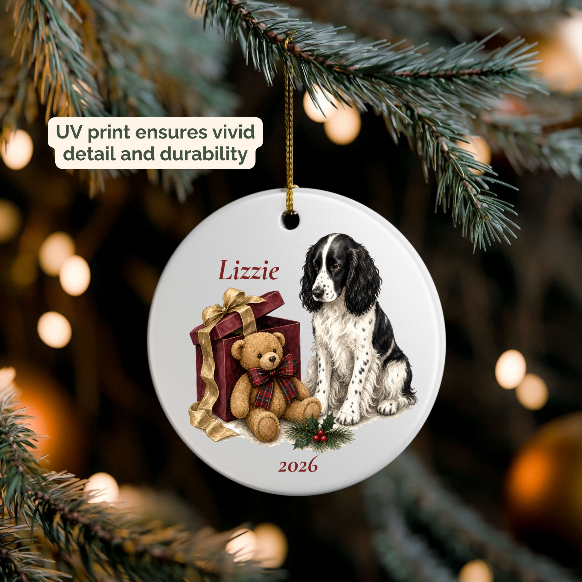 Personalized English Springer Spaniel (Black) ornament hanging on a lit Christmas tree