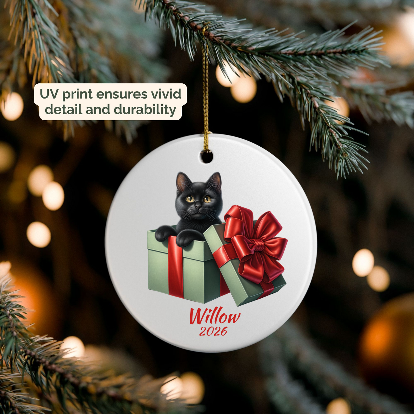 Personalized Black Cat ornament hanging on a lit Christmas tree