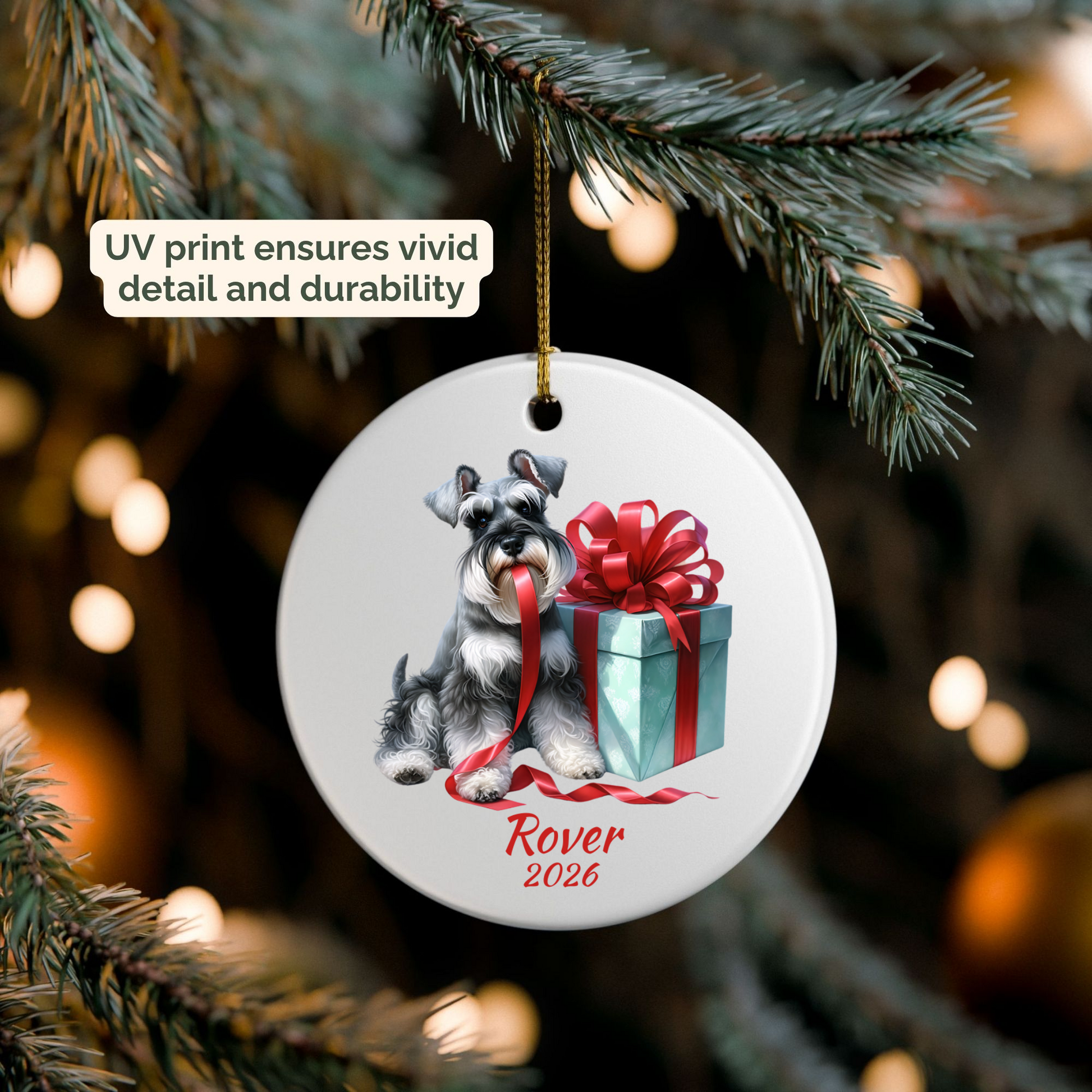 Personalized Miniature Schnauzer ornament hanging on a lit Christmas tree