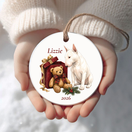Personalized Bull Terrier Christmas ornament held in cupped hands