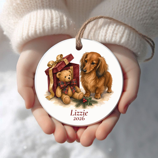 Personalized Longhaired Dachshund Christmas ornament held in cupped hands