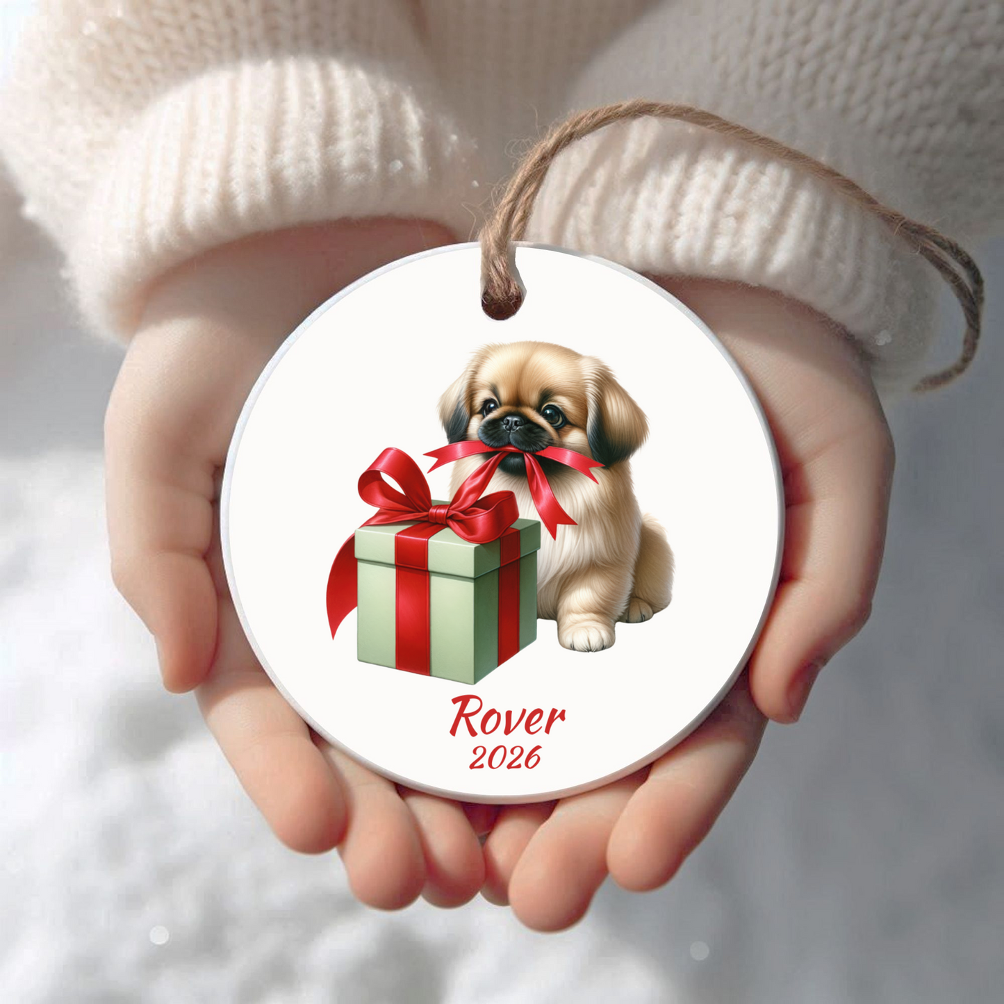 Personalized Pekingese Christmas ornament held in cupped hands