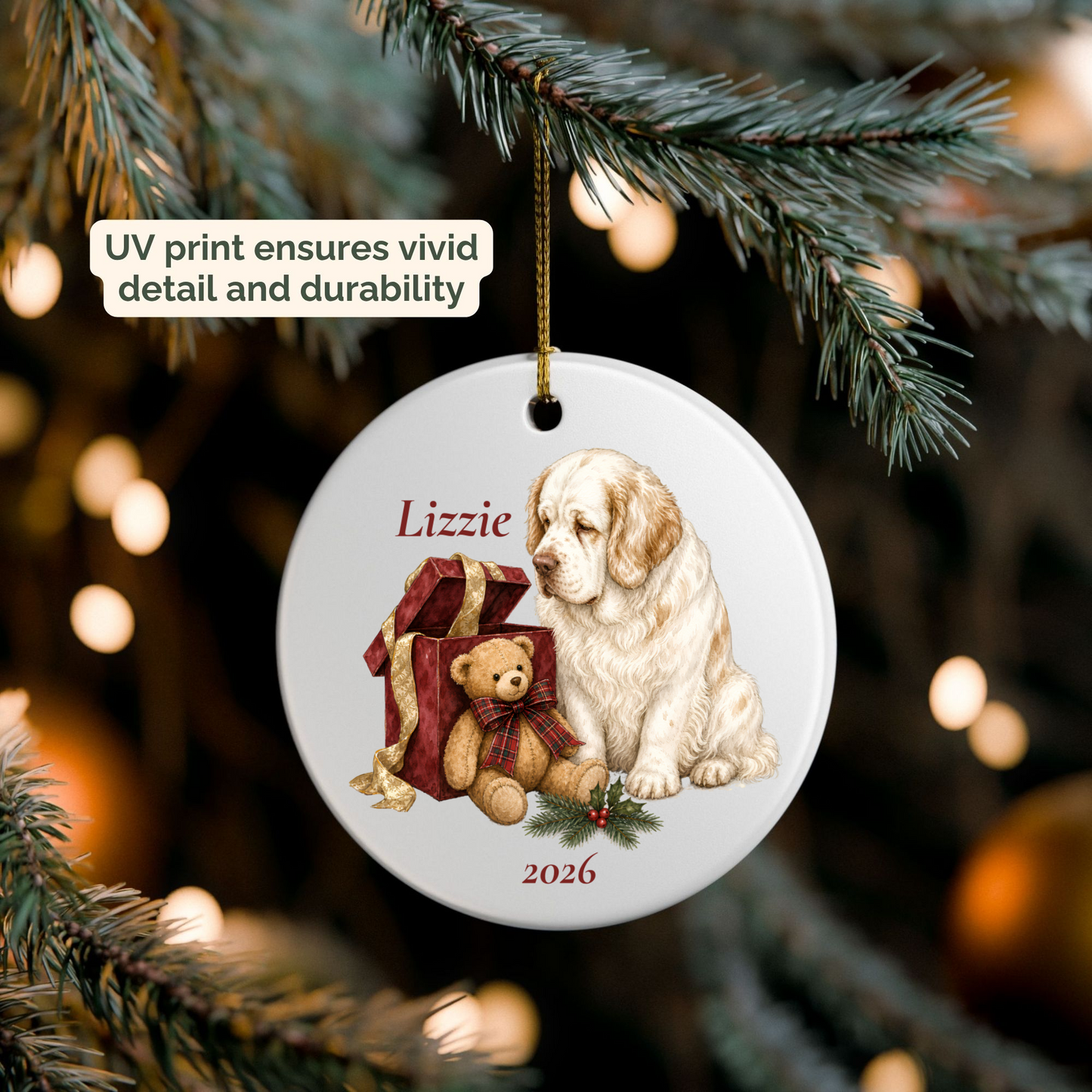 Personalized Clumber Spaniel ornament hanging on a lit Christmas tree
