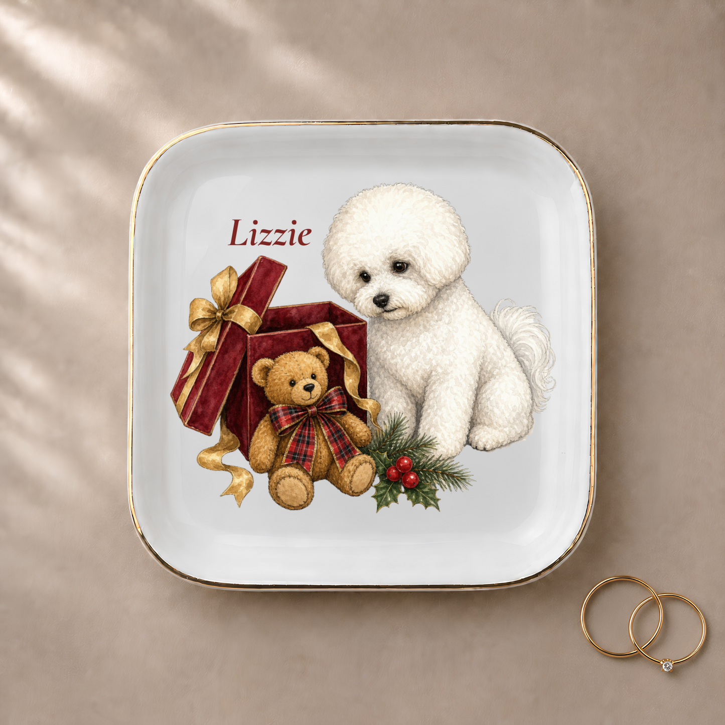 Bichon Frise jewelry dish styled with gold rings and a personalized name
