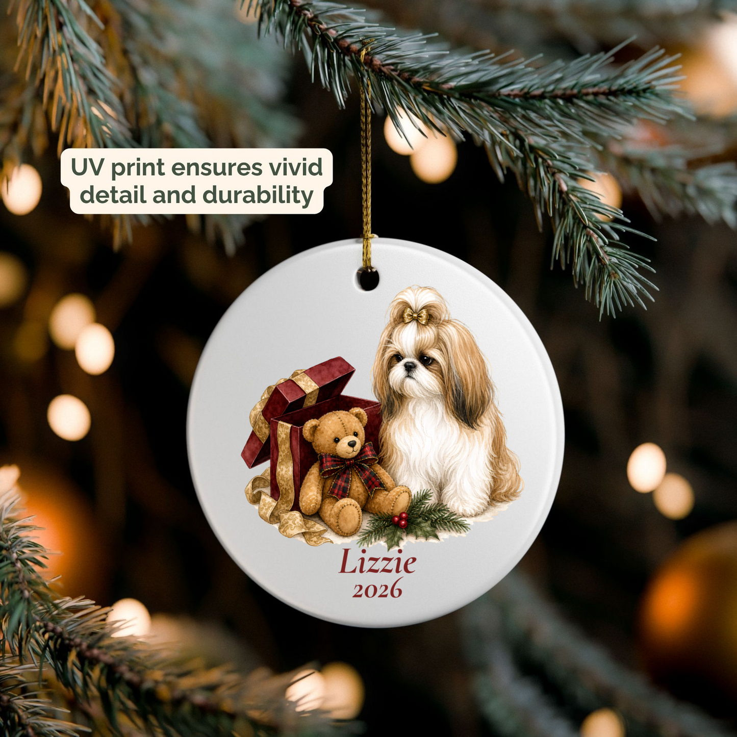 Personalized Shih Tzu wearing a bow ornament hanging on a lit Christmas tree