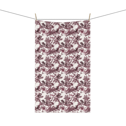 Cat & Butterfly Tea Towel with cranberry toile design, hanging from a clothesline, showing the full repeating design.