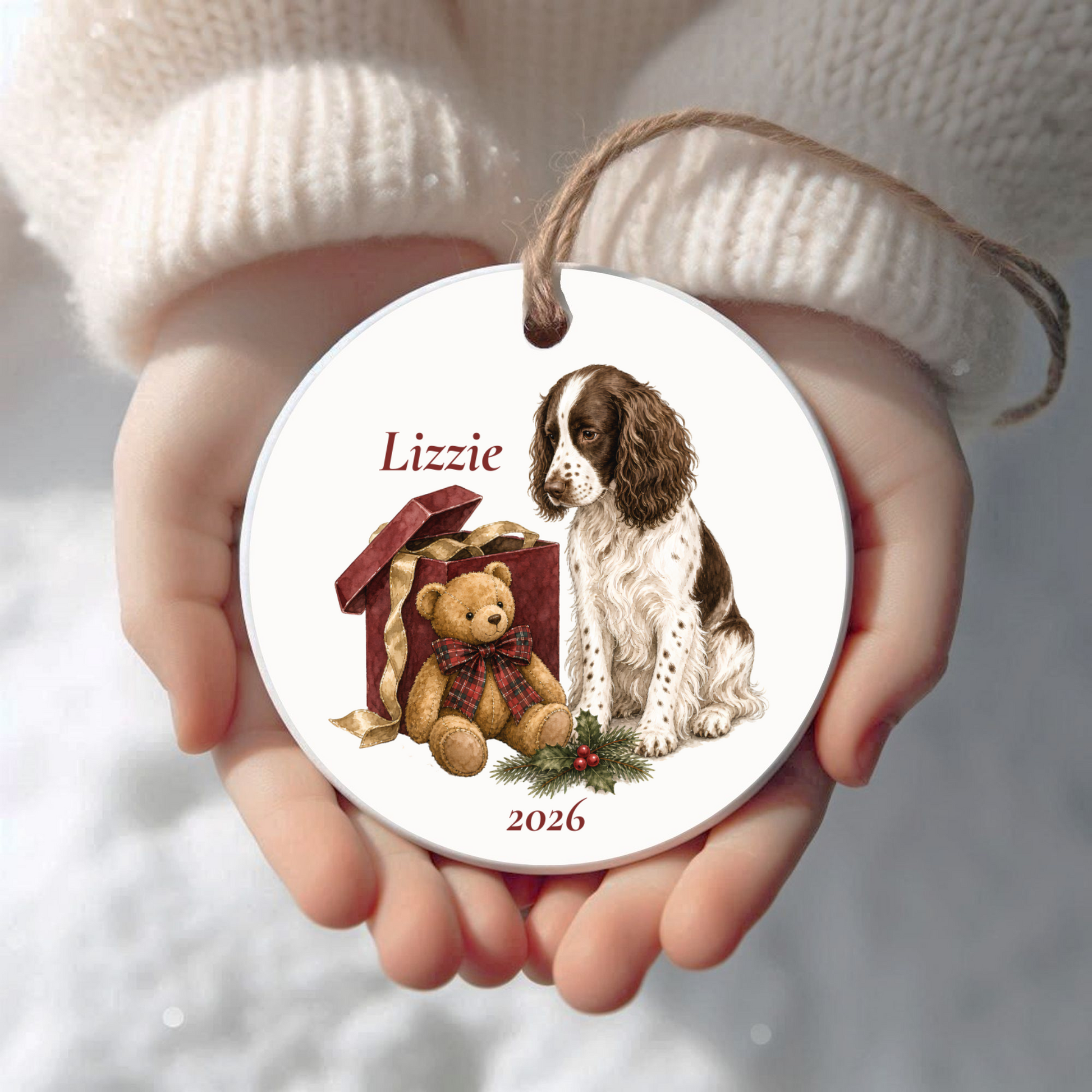 Personalized English Springer Spaniel (Liver) Christmas ornament held in cupped hands