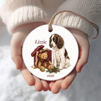 Personalized English Springer Spaniel (Liver) Christmas ornament held in cupped hands