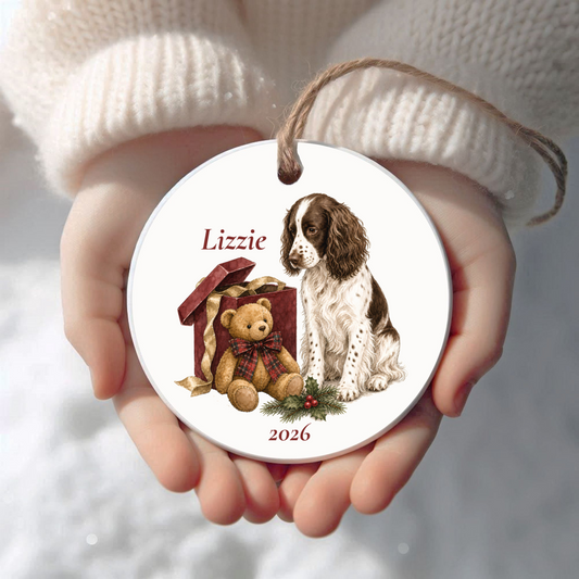 Personalized English Springer Spaniel (Liver) Christmas ornament held in cupped hands