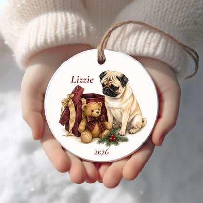 Personalized Pug (Fawn) Christmas ornament held in cupped hands