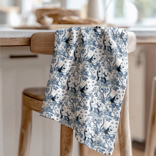 American Eskimo Dog blue toile tea towel displayed in a kitchen