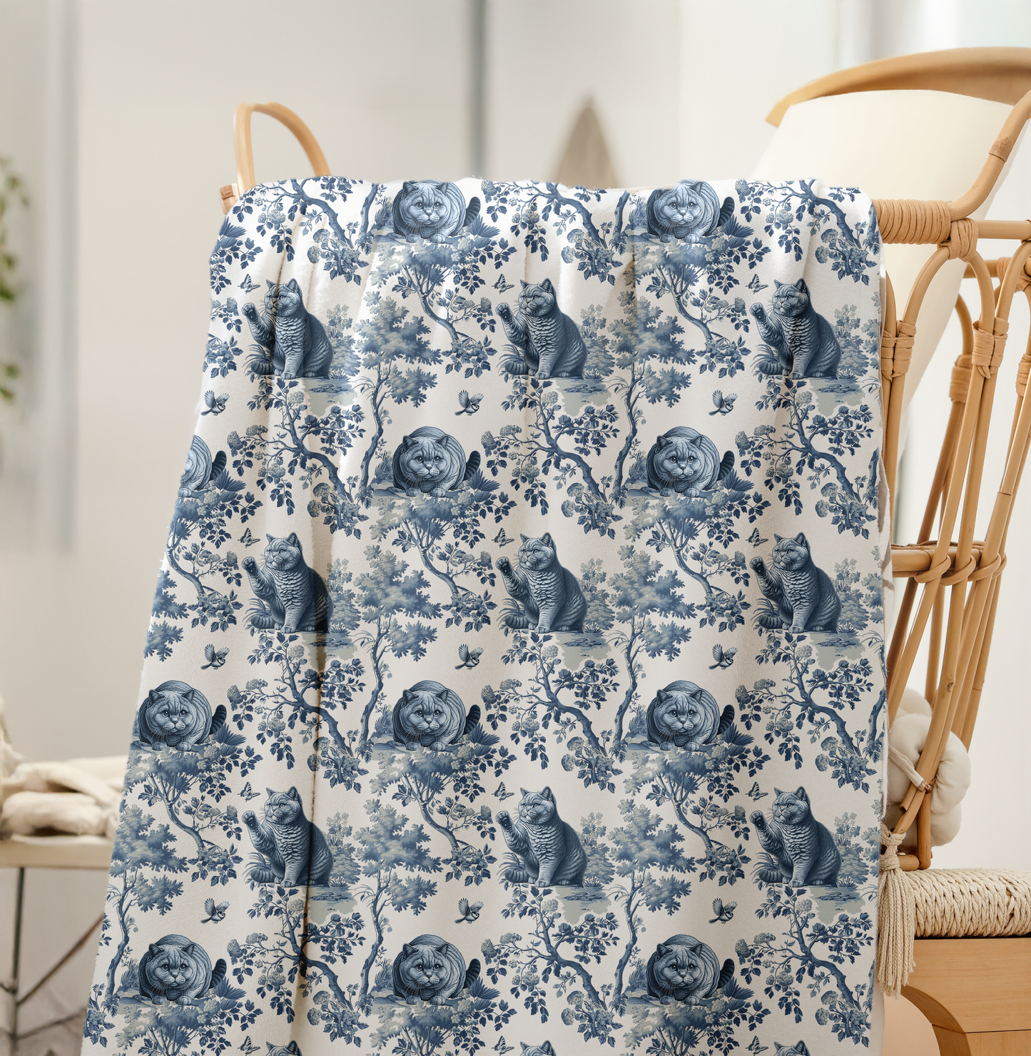 Blue toile British Shorthair Cat throw blanket draped on a chair