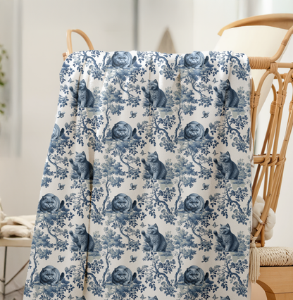 Blue toile British Shorthair Cat throw blanket draped on a chair