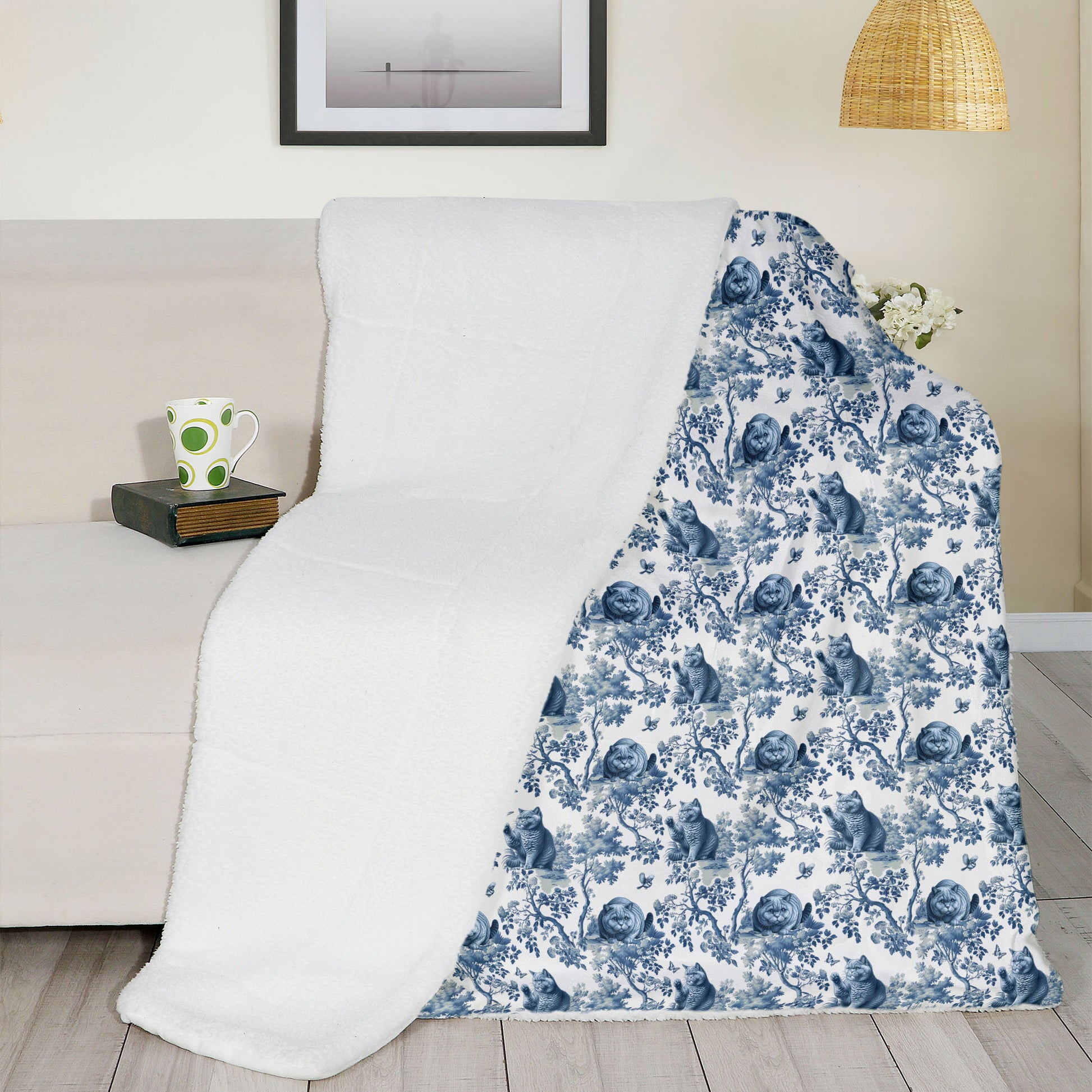 Blue toile British Shorthair Cat throw blanket, 50 by 60 inches in a sofa setting