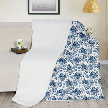 Blue toile British Shorthair Cat throw blanket, 50 by 60 inches in a sofa setting