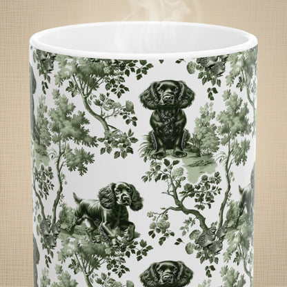 Close-up of the sage green toile pattern on a Boykin Spaniel coffee mug