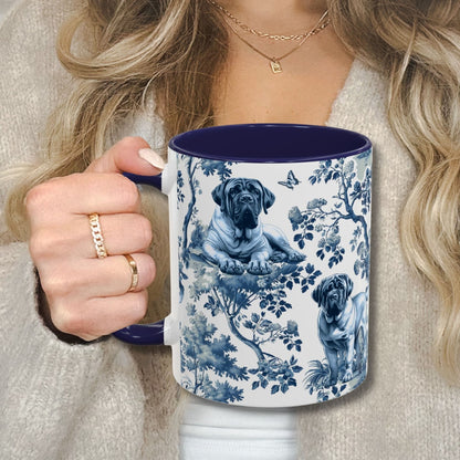 Blue toile English Mastiff coffee cup against a cozy beige sweater