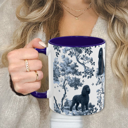 Blue toile Irish Water Spaniel coffee cup against a cozy beige sweater