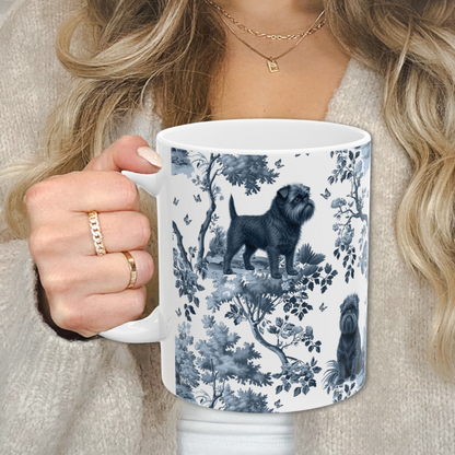 Affenpinscher blue toile white handle mug held by a person in a beige sweater