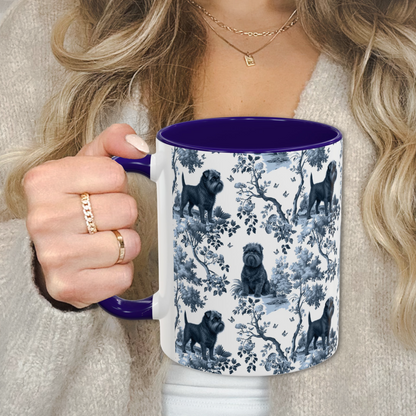 Affenpinscher blue toile mug held by a person in a beige sweater