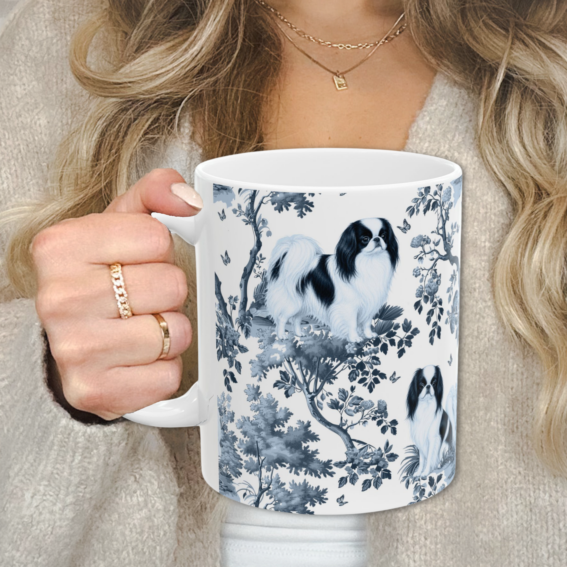 Smooth Fox Terrier blue toile white handle mug held by a person in a beige sweater