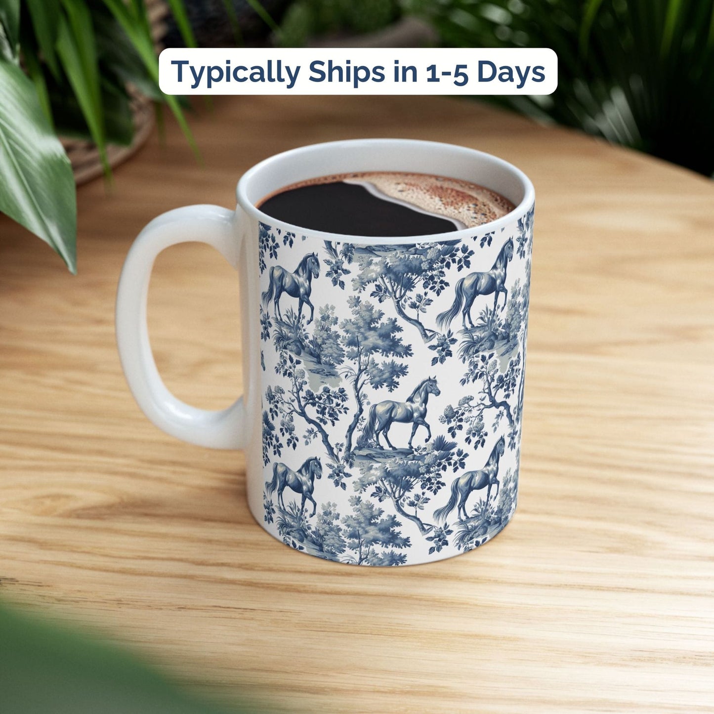 Classic blue toile Horse coffee cup styled on a wooden board in a festive setting