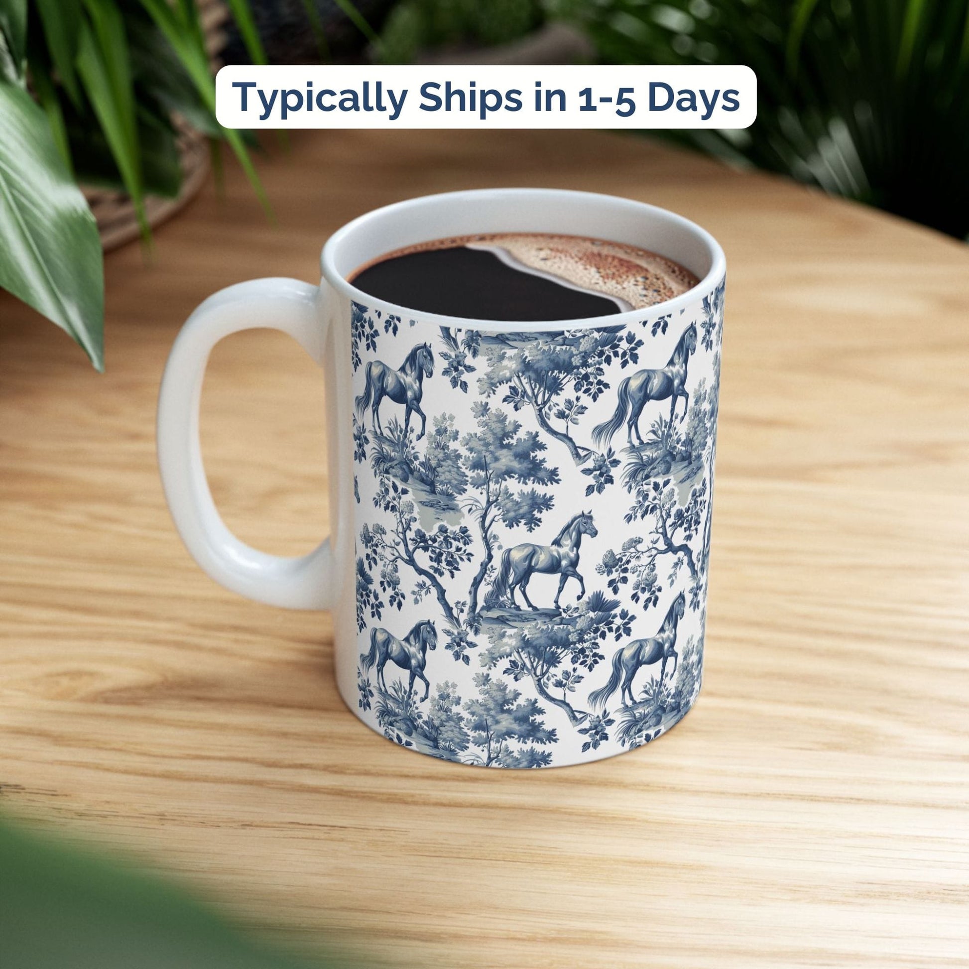 Classic blue toile Horse coffee cup styled on a wooden board in a festive setting