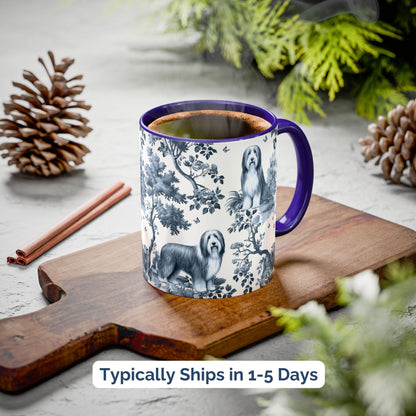 Blue toile Bearded Collie coffee cup styled on a wooden board in a festive setting
