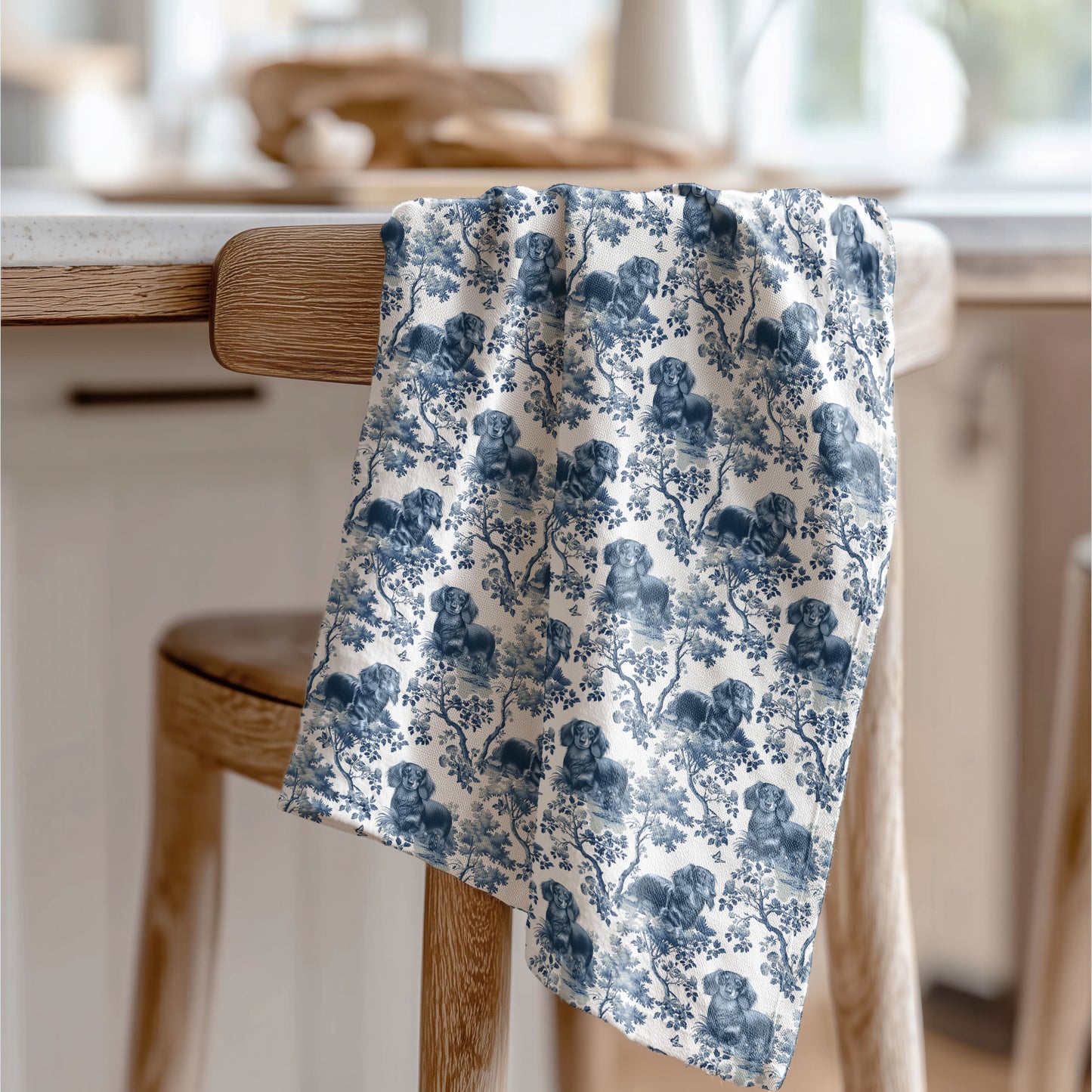 Longhaired Dachshund blue toile tea towel displayed in a kitchen