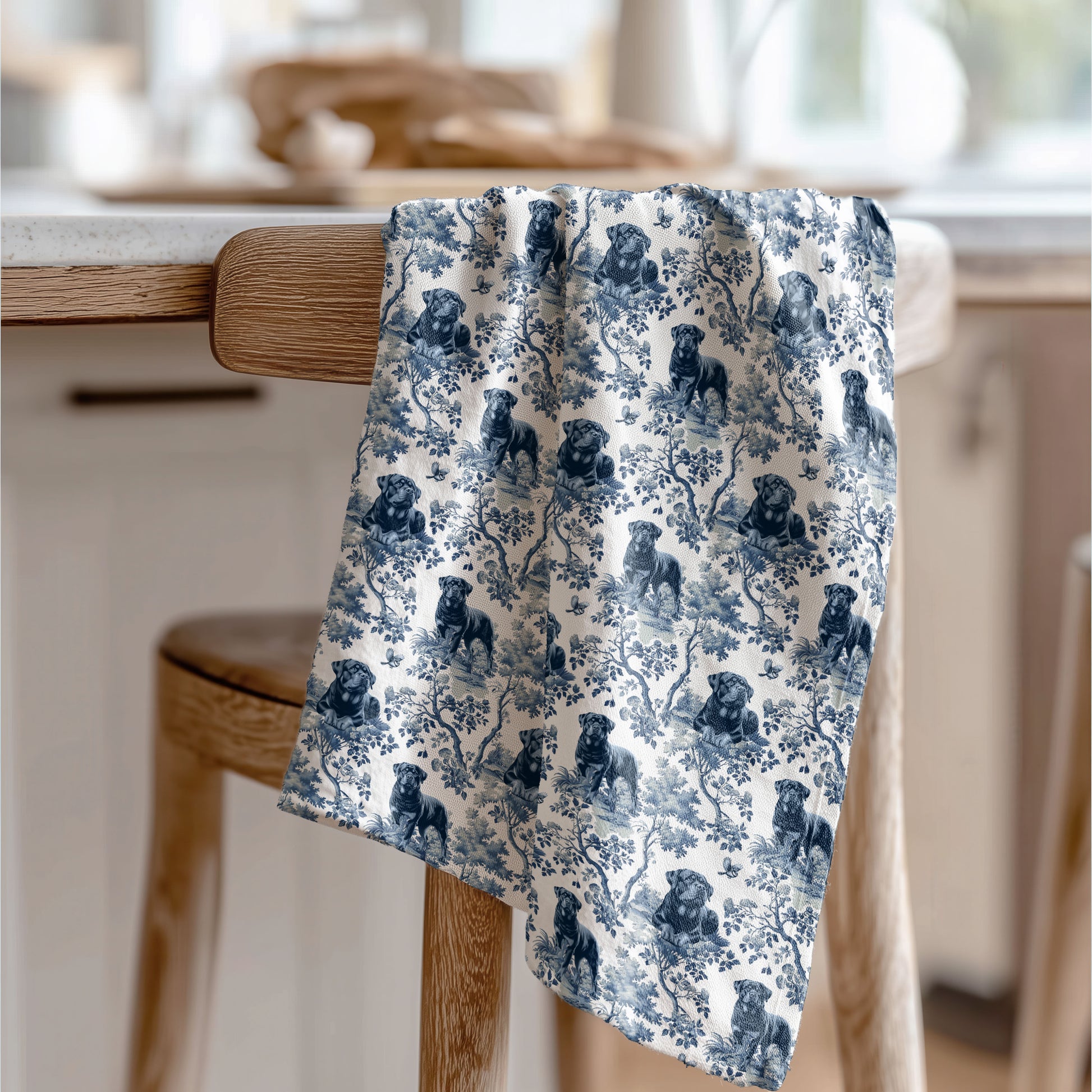 Rottweiler blue toile tea towel displayed in a kitchen