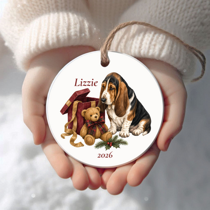 Personalized Basset Hound Christmas ornament held in cupped hands