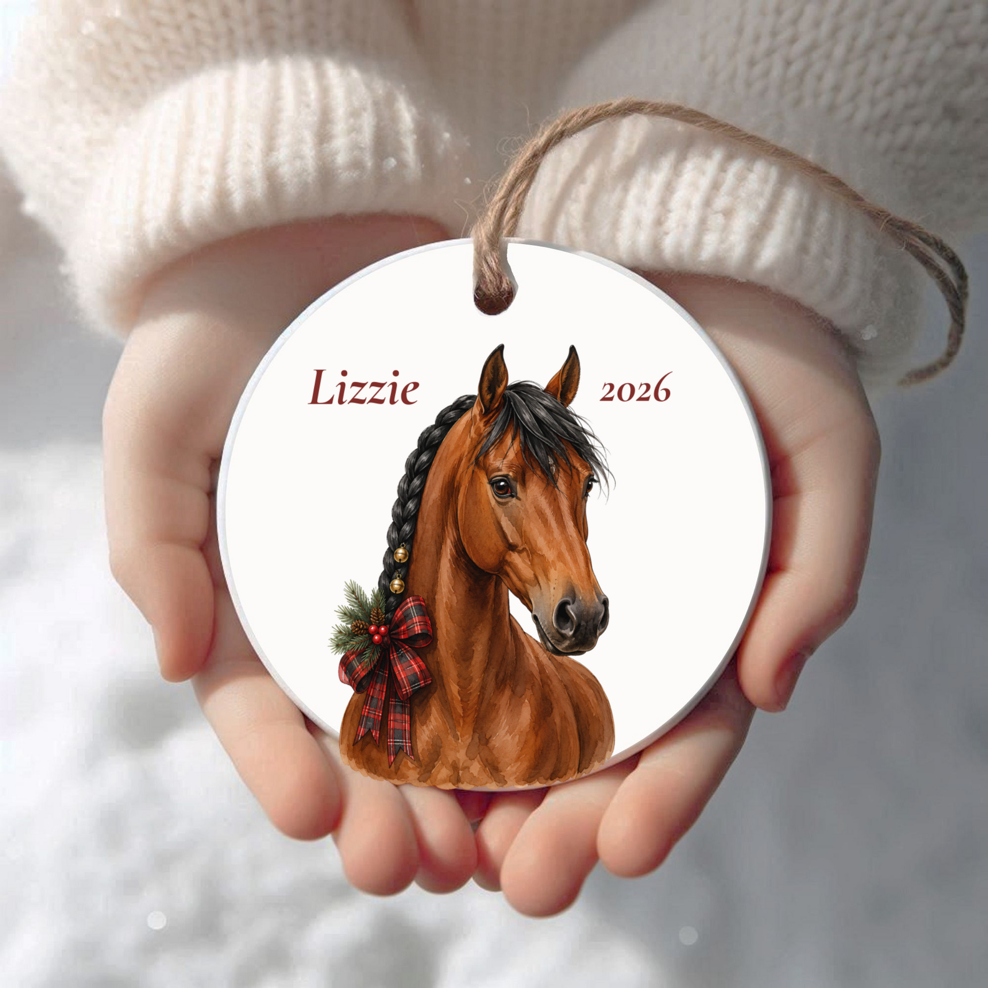 Personalized bay horse Christmas ornament held in cupped hands