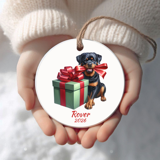 Personalized Rottweiler Christmas ornament held in cupped hands