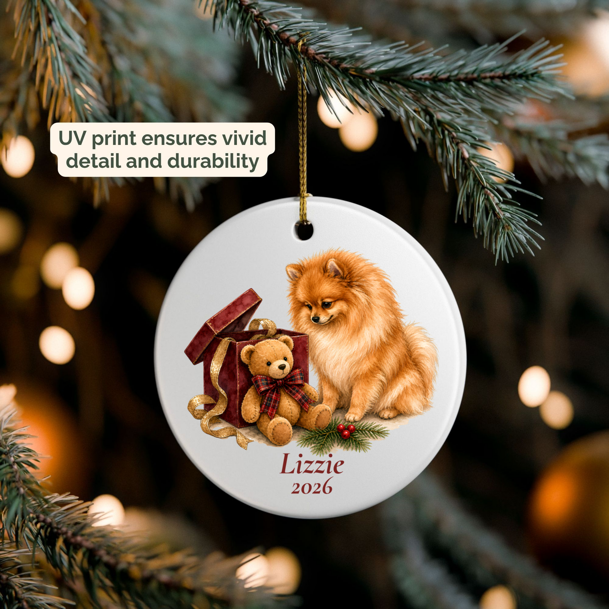 Personalized Pomeranian ornament hanging on a lit Christmas tree