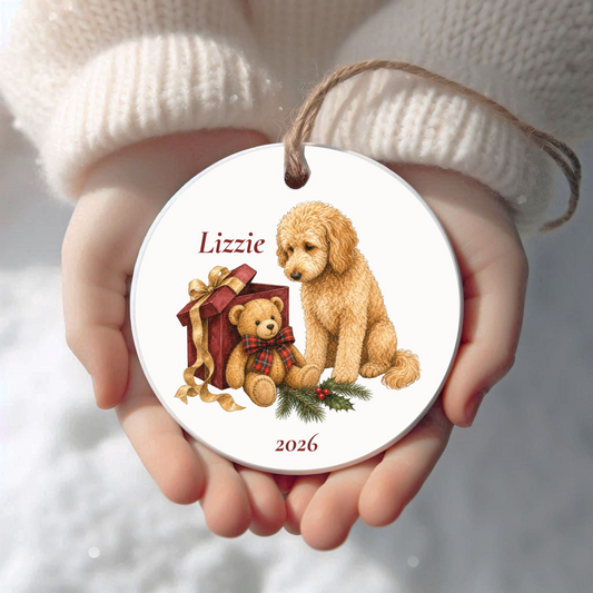 Personalized Goldendoodle Christmas ornament held in cupped hands