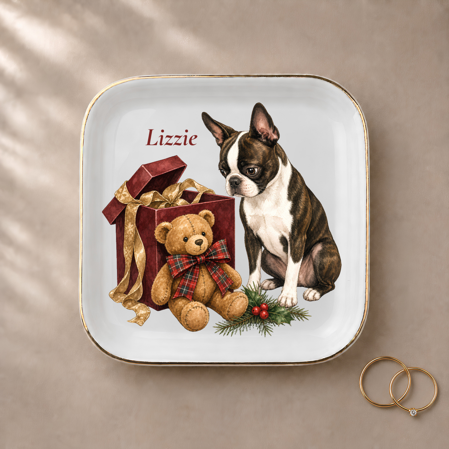 Boston Terrier jewelry dish styled with gold rings and a personalized name