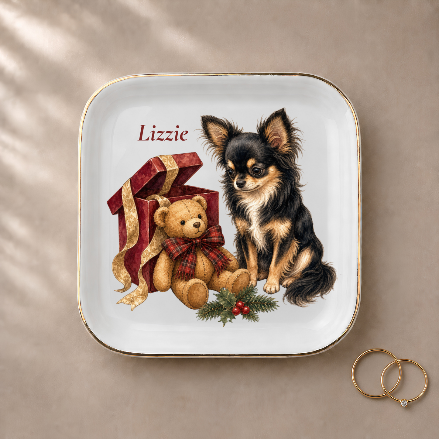 Longhaired Chihuahua jewelry dish styled with gold rings and a personalized name
