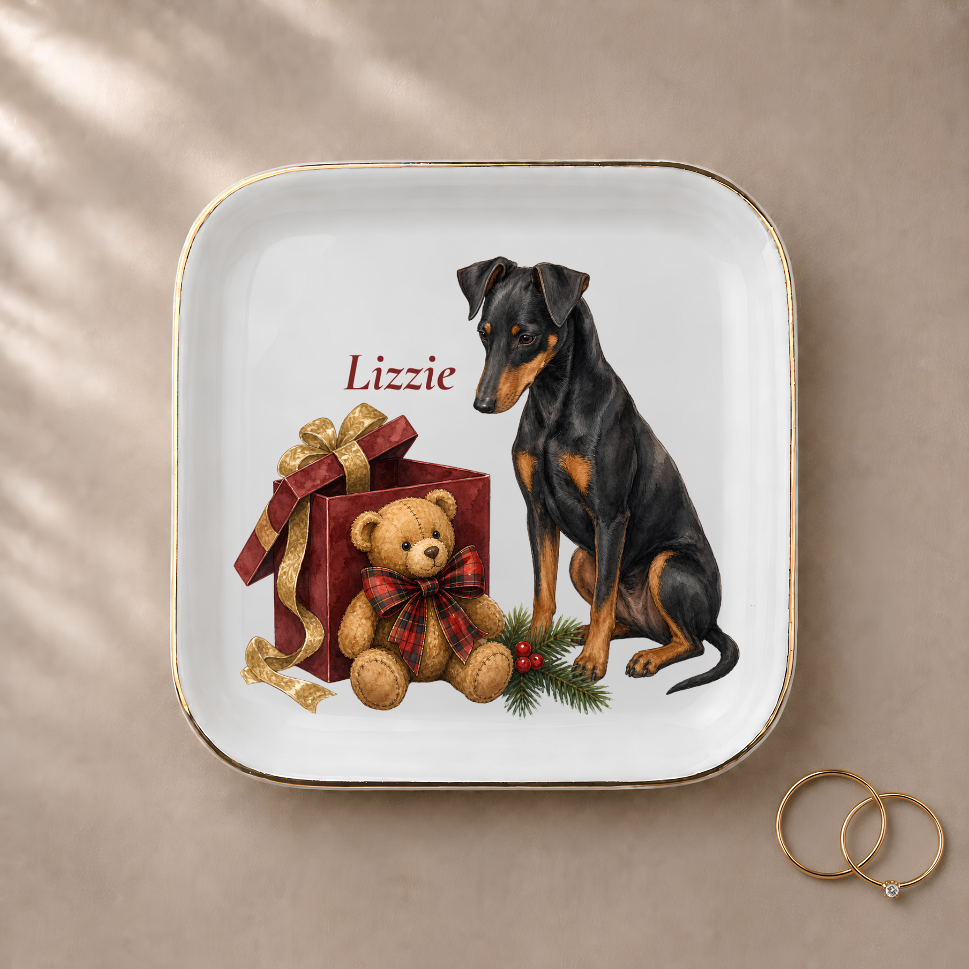 Manchester Terrier jewelry dish styled with gold rings and a personalized name
