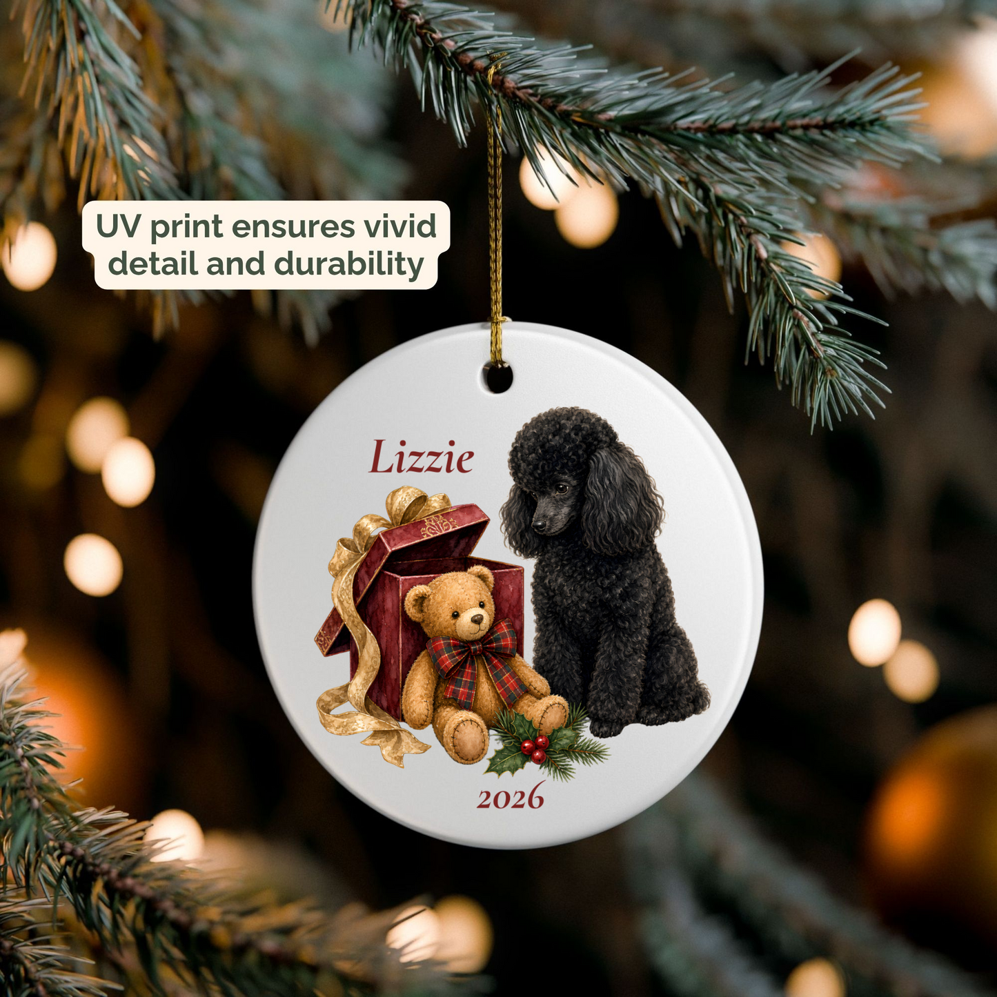 Personalized Miniature Poodle (Black) ornament hanging on a lit Christmas tree