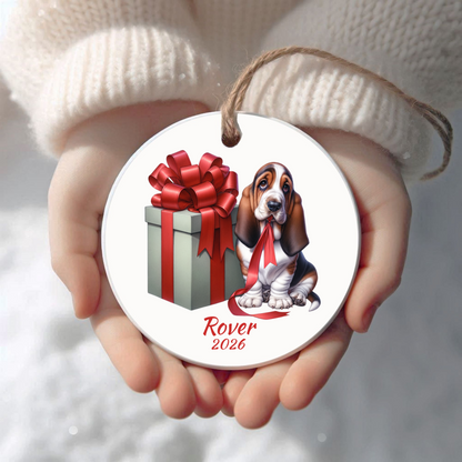 Personalized Basset Hound Christmas ornament held in cupped hands