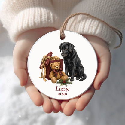 Personalized Labrador Retriever (Black) Christmas ornament held in cupped hands