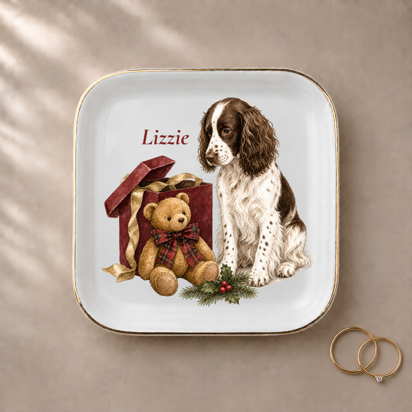 English Springer Spaniel jewelry dish styled with gold rings and a personalized name