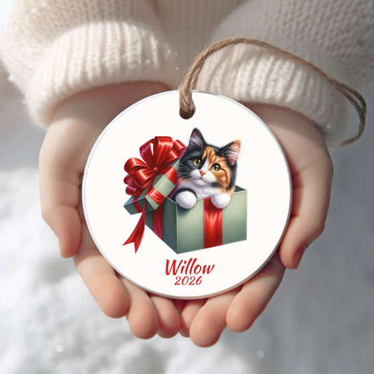 Personalized Calico Cat Christmas ornament held in cupped hands