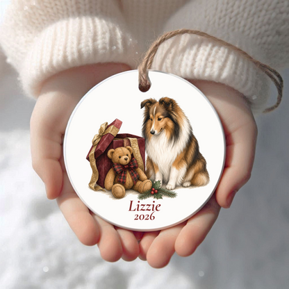 Personalized Shetland Sheepdog Christmas ornament held in cupped hands