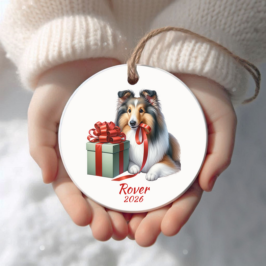 Personalized Shetland Sheepdog Christmas ornament held in cupped hands